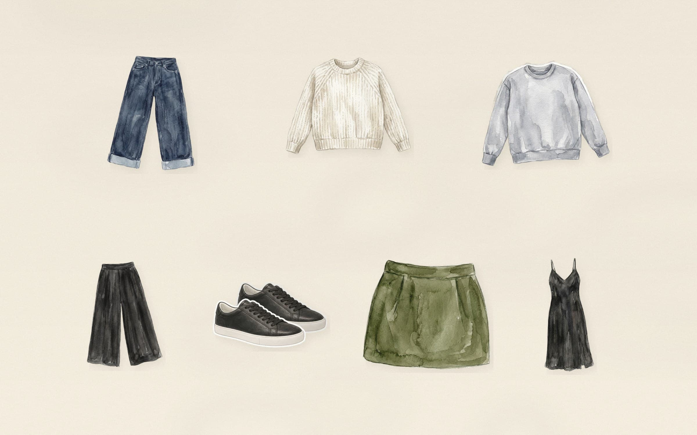 Flat-lay of black leather low-top sneakers with dark indigo wide-leg jeans, cream chunky knit, heather grey sweatshirt, black trousers, olive mini skirt, and black slip dress on cream paper.