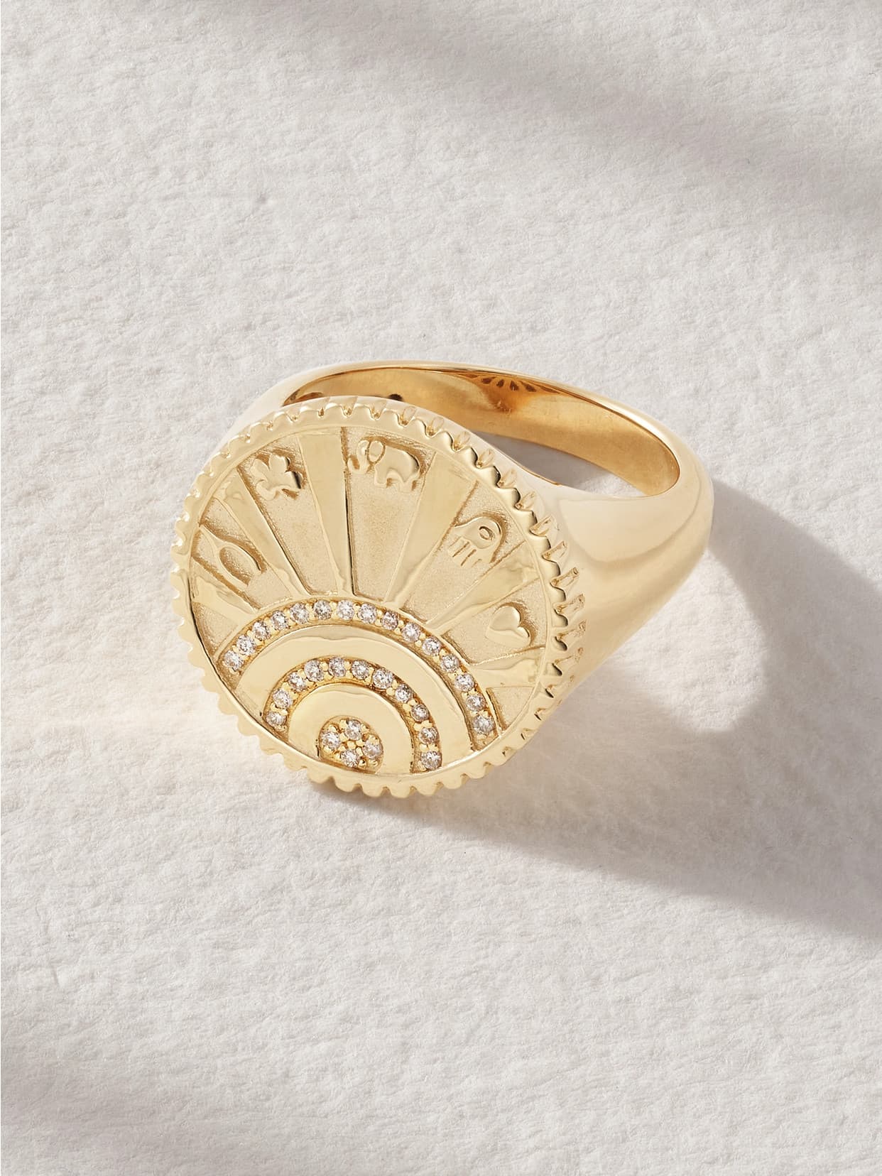 Sydney Evan small luck coin gold diamond signet ring photographed by Net-a-Porter.