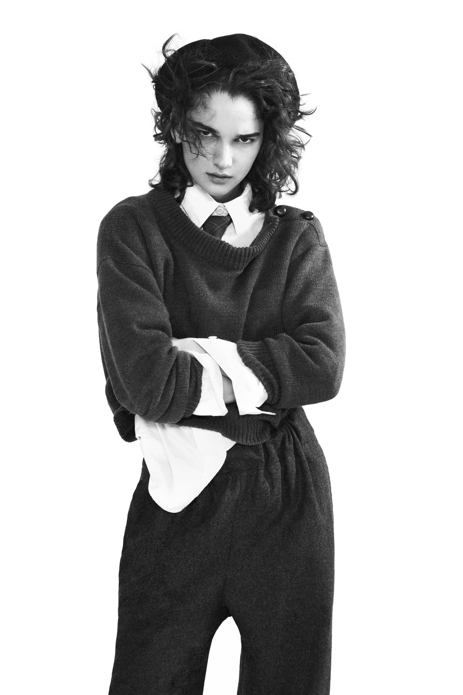 Margaret Howell AW21 editorial look with dark tailoring and bookish proportions.