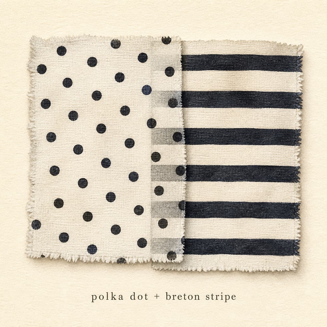 Black-and-white polka dot and Breton stripe swatches overlapping on cream paper.