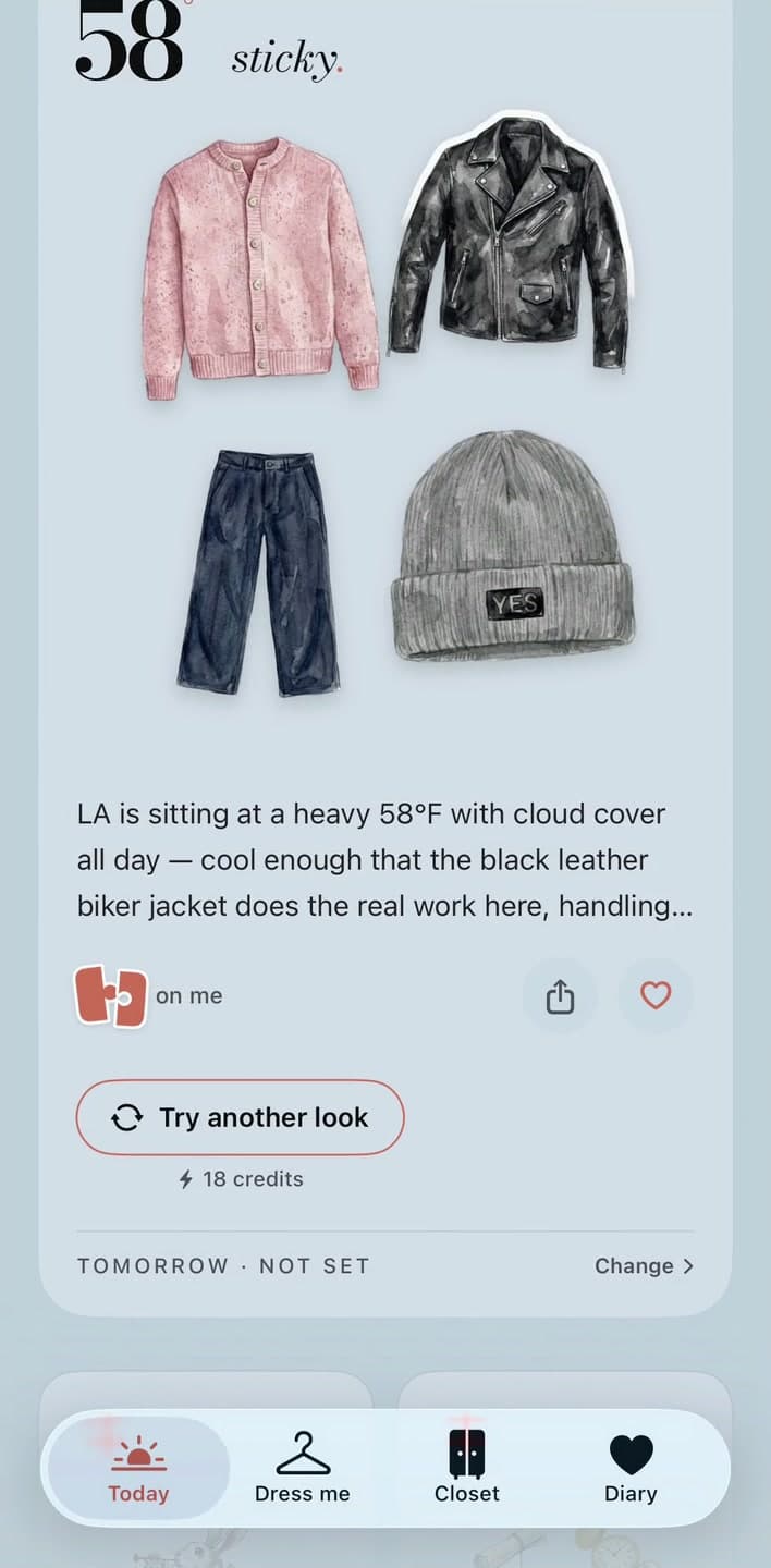 The same Los Angeles look after tapping the pieces, showing the cardigan, leather jacket, trousers and beanie, with the on me switch below.