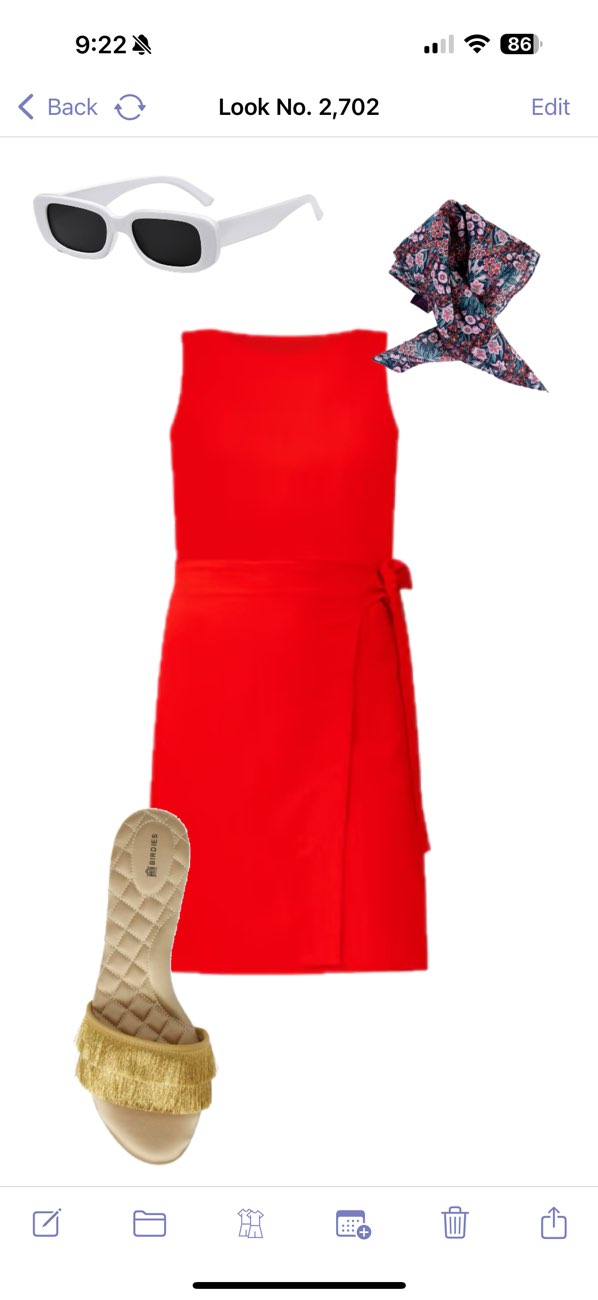Stylebook upload screen with manual cropping tools visible at the edges of a single-garment photo.